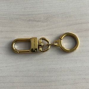 Authentic Louis Vuitton gold tone key/cles ring. Also works as a strap extender